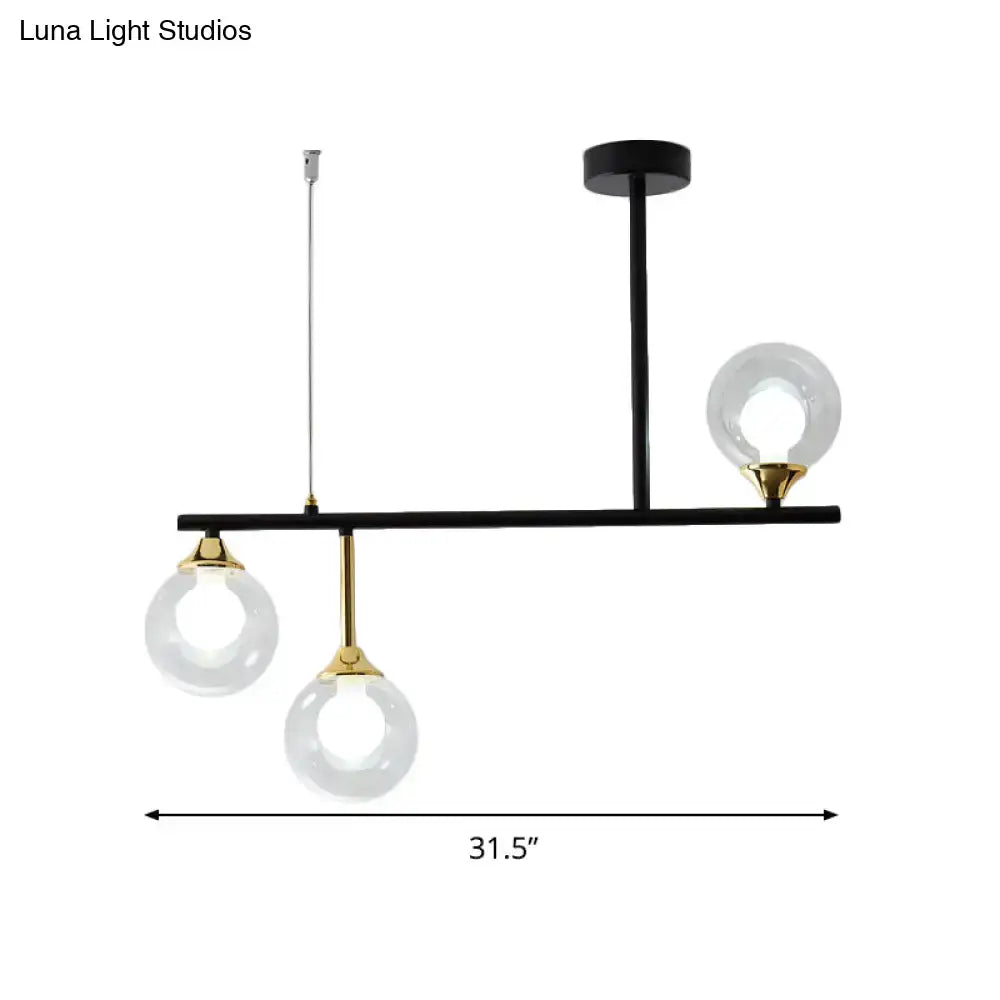 Modern black and gold globe pendant light for dining room