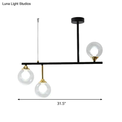 Modern black and gold globe pendant light for dining room