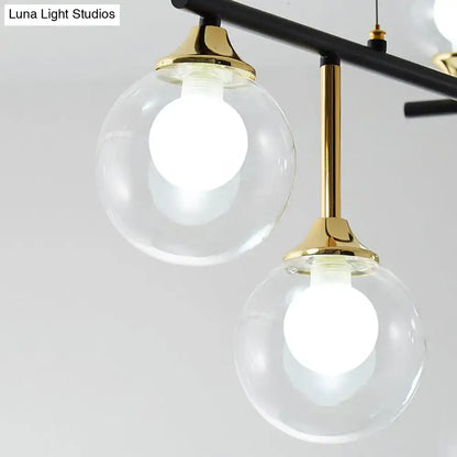 Modern black and gold globe pendant light for dining room
