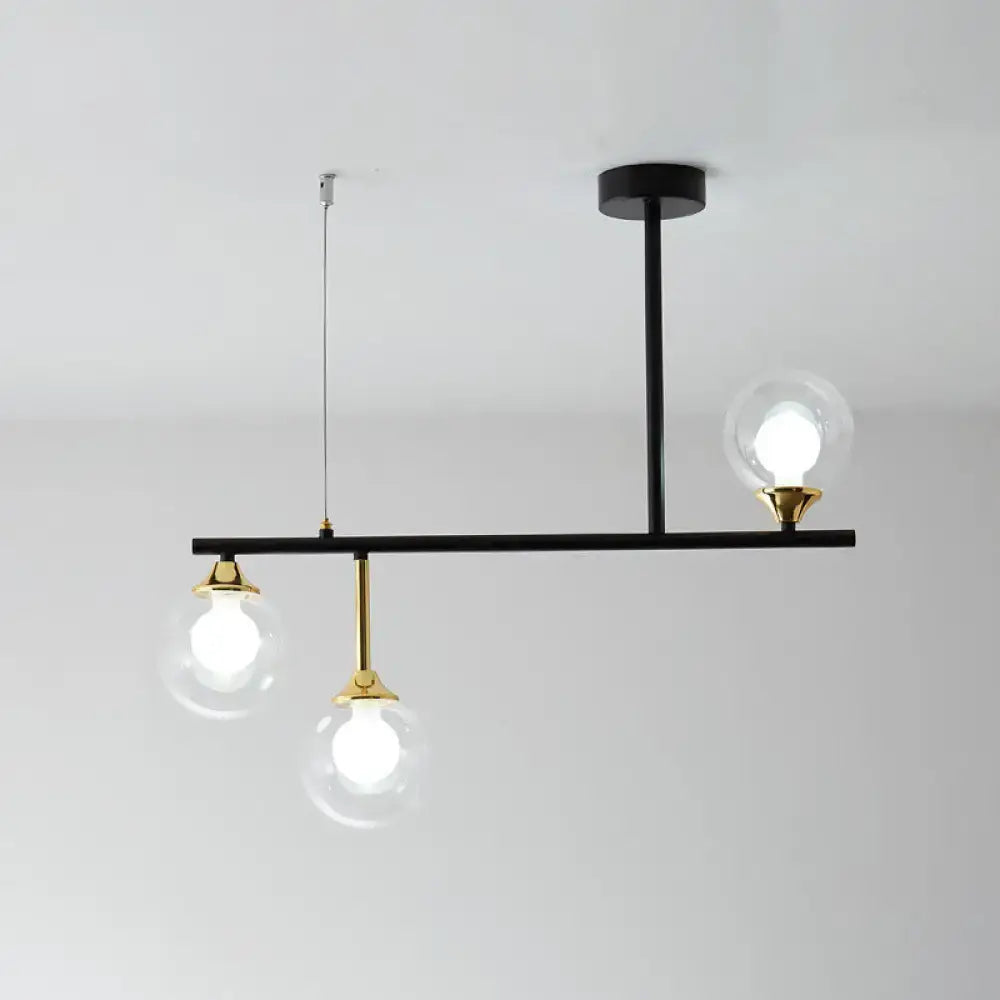 Modern black and gold globe pendant light for dining room