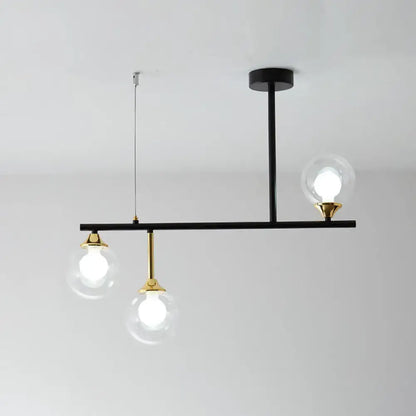 Modern black and gold globe pendant light for dining room