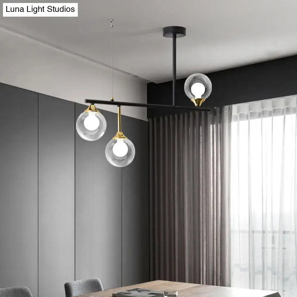 Modern black and gold globe pendant light for dining room