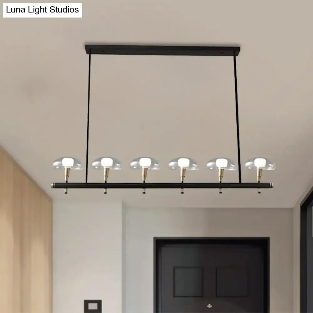 Modern black and gold island pendant light with glass shades kitchen