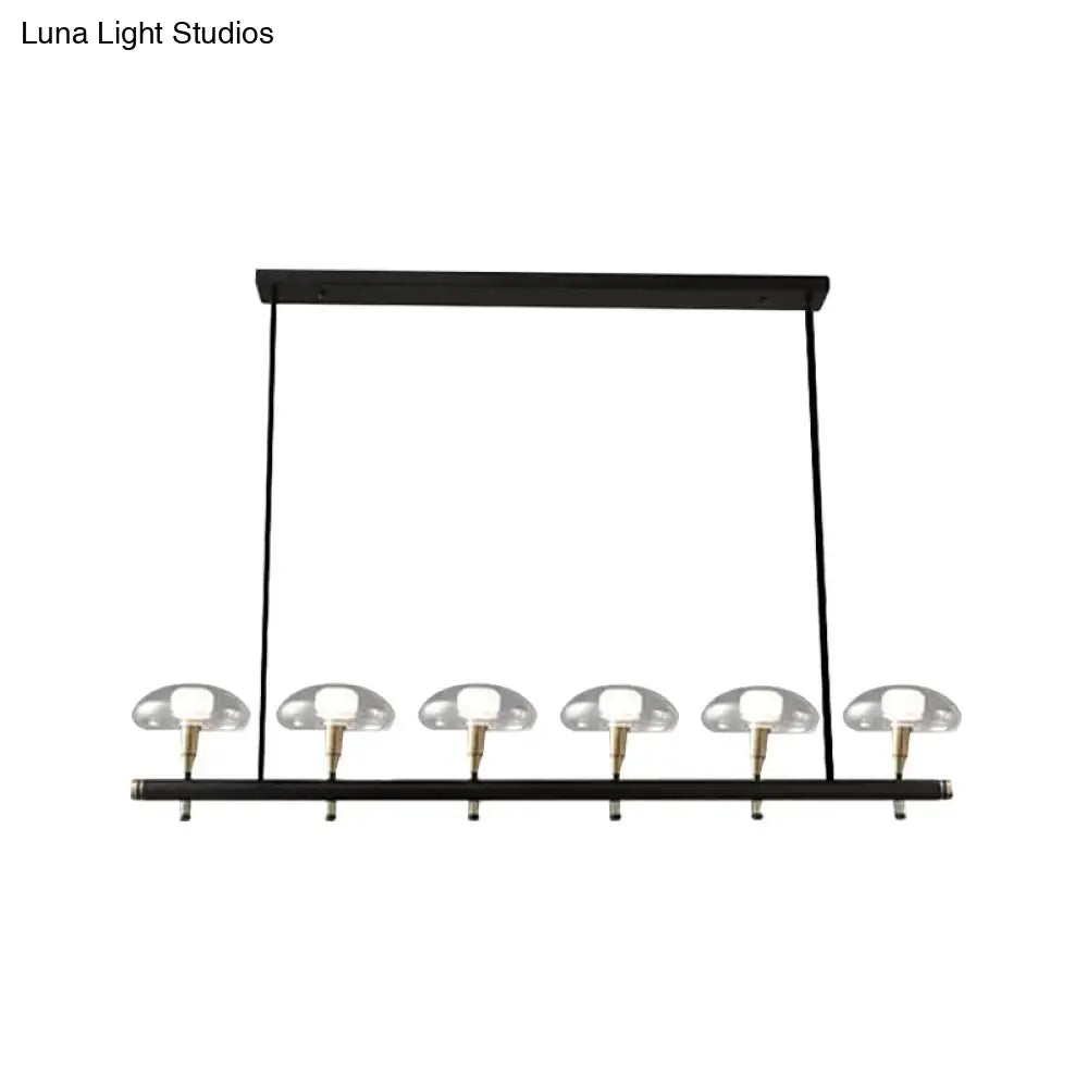 Modern black and gold island pendant light with glass shades kitchen