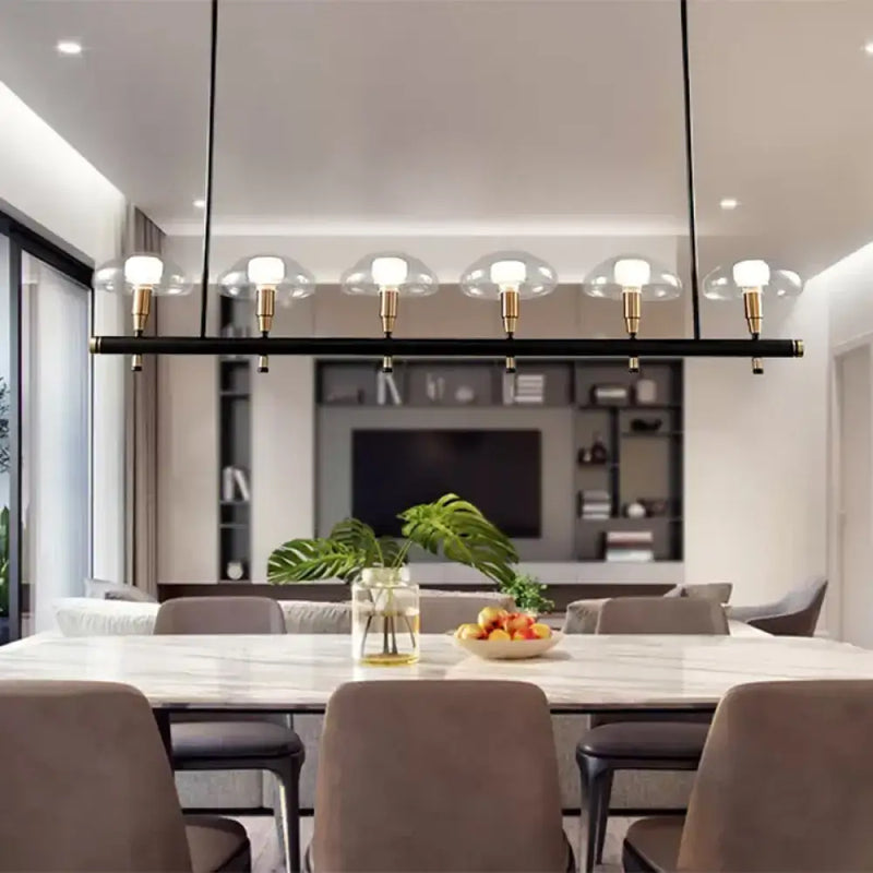 Modern black and gold island pendant light with glass shades kitchen