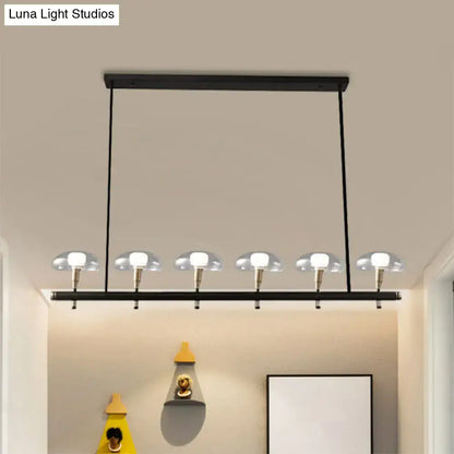 Modern black and gold island pendant light with glass shades kitchen