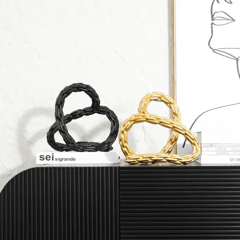 Modern black and golden knot chain sculpture living room decor