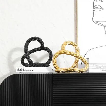 Modern black and golden knot chain sculpture living room decor