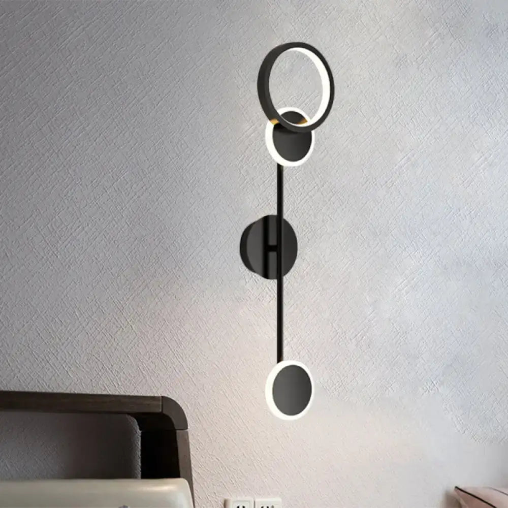 Modern black and white metallic round led wall sconce – living room