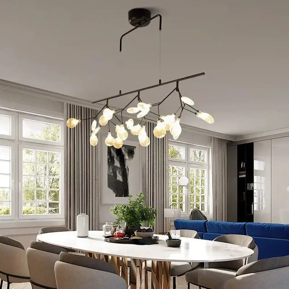 Modern black branching chandelier with frosted globes – dining room