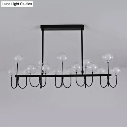 Modern black ceiling light with clear glass globe – dining room