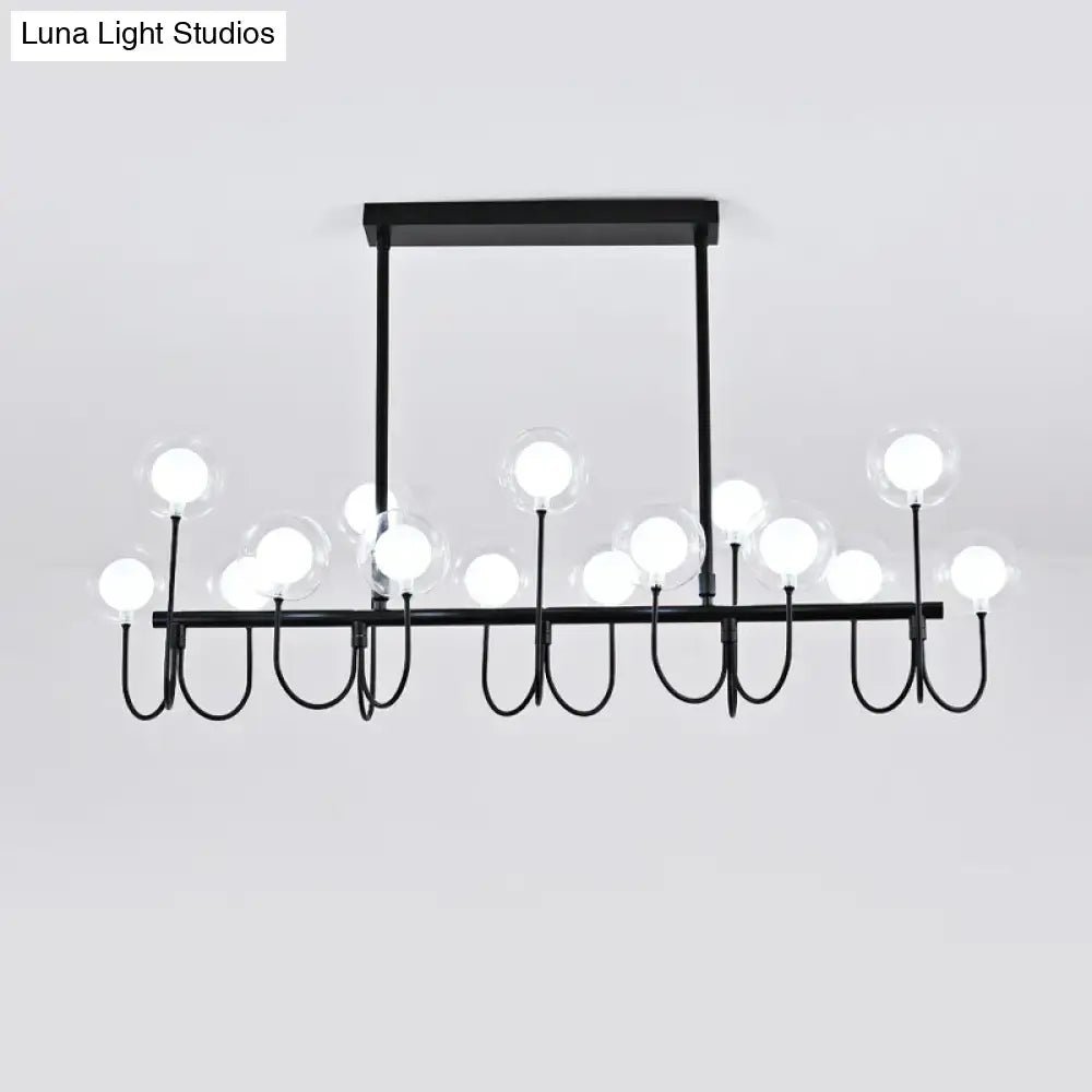 Modern black ceiling light with clear glass globe – dining room