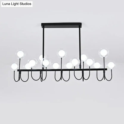 Modern black ceiling light with clear glass globe – dining room