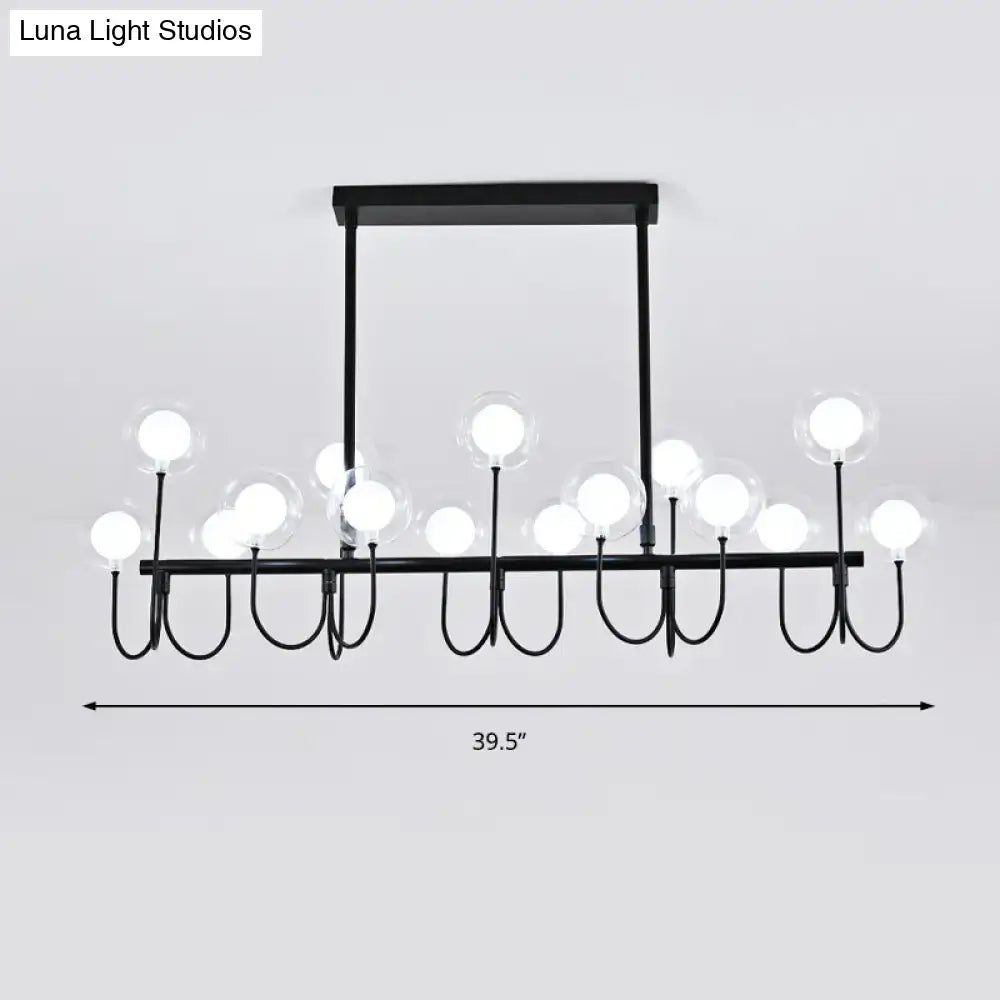Modern black ceiling light with clear glass globe – dining room