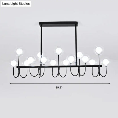 Modern black ceiling light with clear glass globe – dining room