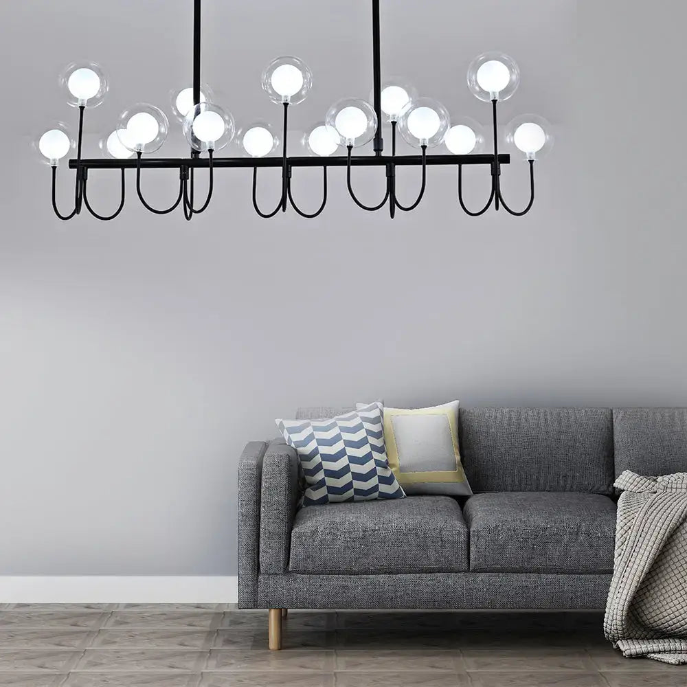 Modern black ceiling light with clear glass globe – dining room