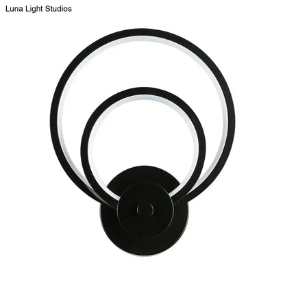 Modern black circular led light fixture – bedroom wall sconce