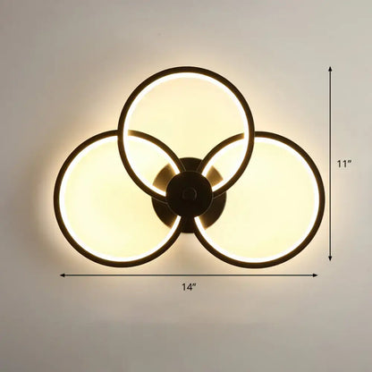 Modern black circular led light fixture – bedroom wall sconce
