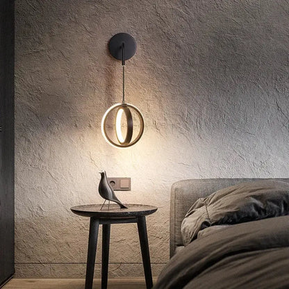 Modern black circular wall sconce light – bedroom glowing ring light