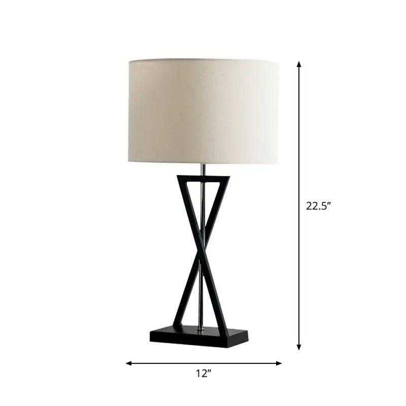 Modern black geometric nightstand lamp with cream drum shade bedroom