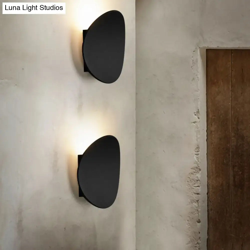 Modern black geometric wall lighting fixture for bedroom