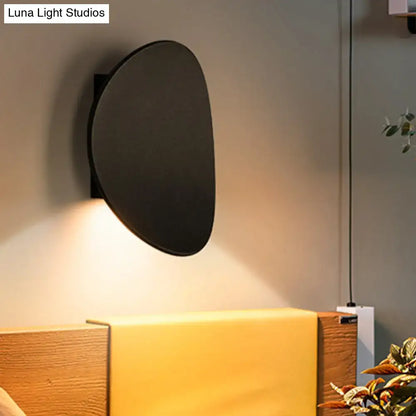 Modern black geometric wall lighting fixture for bedroom