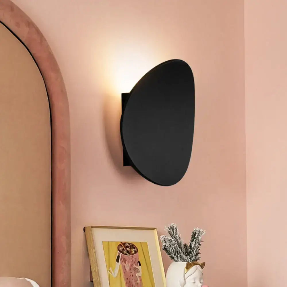 Modern black geometric wall lighting fixture for bedroom
