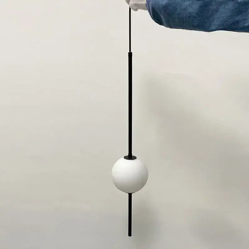 Modern black glass ball pendant lights for dining room