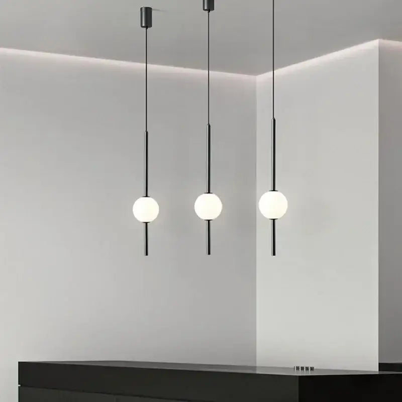 Modern black glass ball pendant lights for dining room