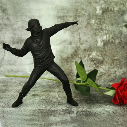 Modern black glossy bansky flower thrower sculpture office decor