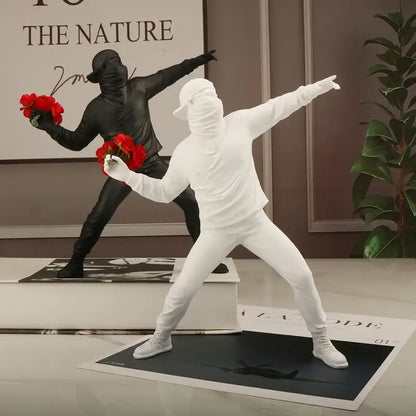 Modern black glossy bansky flower thrower sculpture office decor