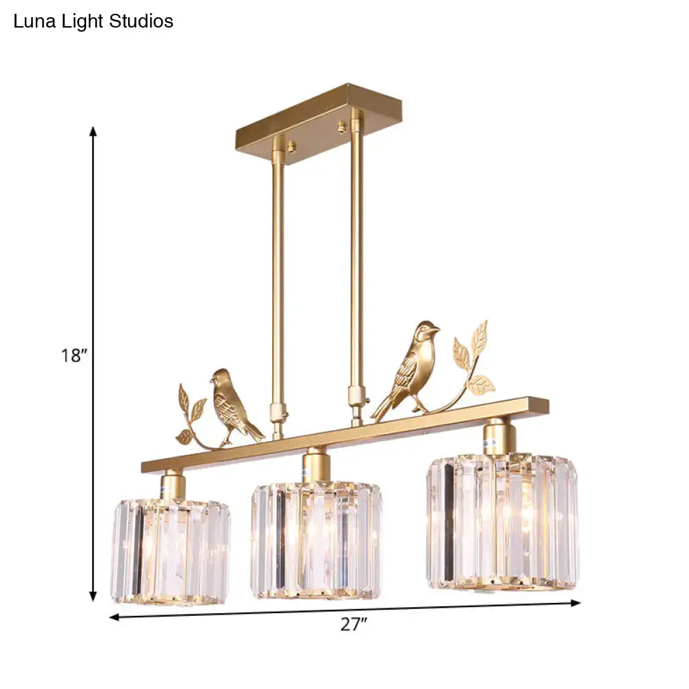 Modern black & gold bird pendant light with clear crystal drum shade