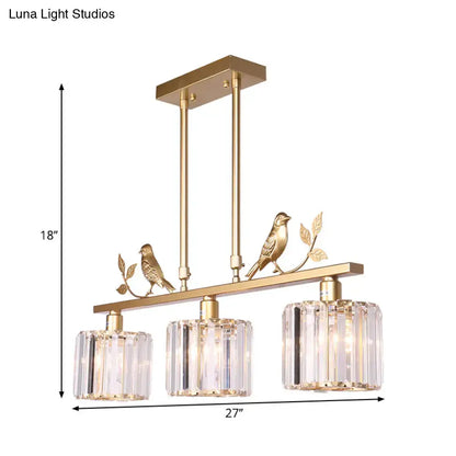 Modern black & gold bird pendant light with clear crystal drum shade
