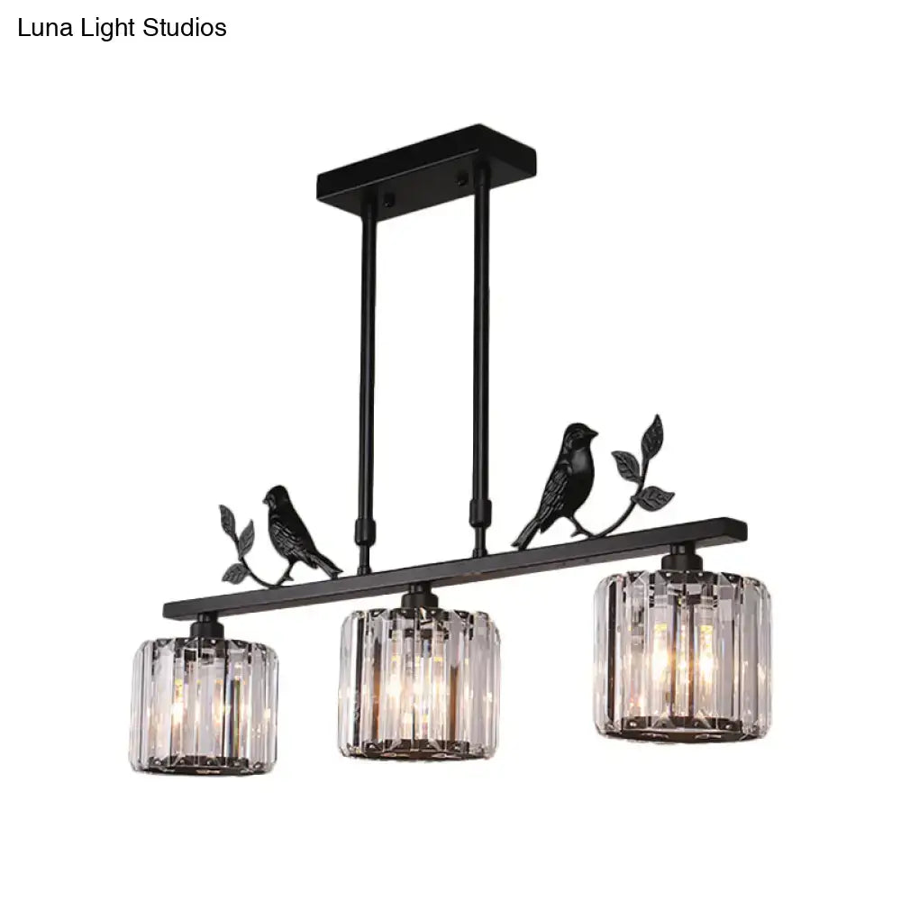 Modern black & gold bird pendant light with clear crystal drum shade