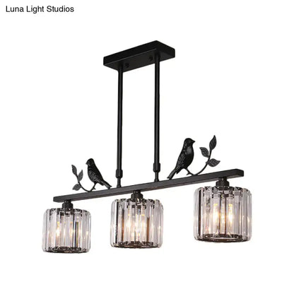 Modern black & gold bird pendant light with clear crystal drum shade