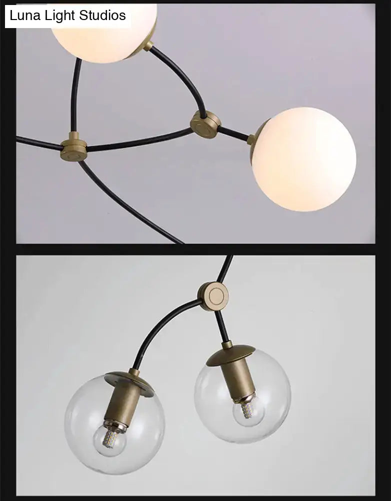 Modern black & gold island light with ball glass shade dining room