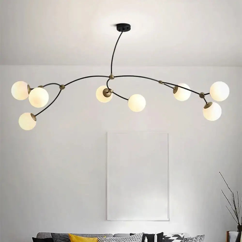 Modern black & gold island light with ball glass shade dining room