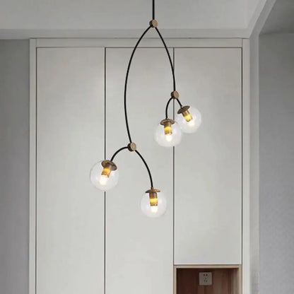 Modern black & gold island light with ball glass shade dining room