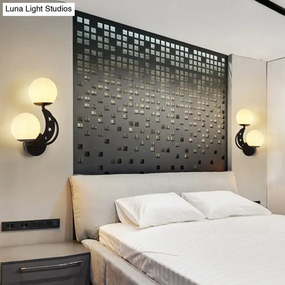 Modern black & gold moon wall lamp with milky glass ball bedroom light