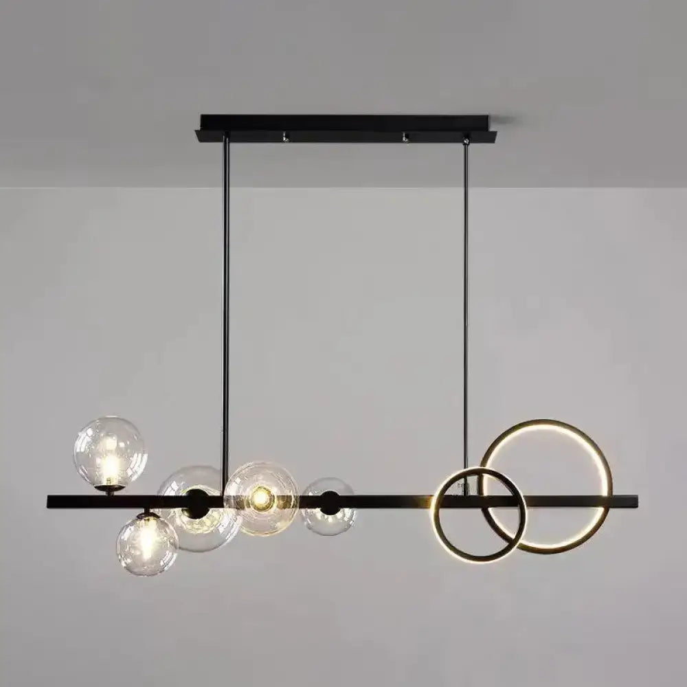 Modern black & gold pendant light with clear glass for dining room