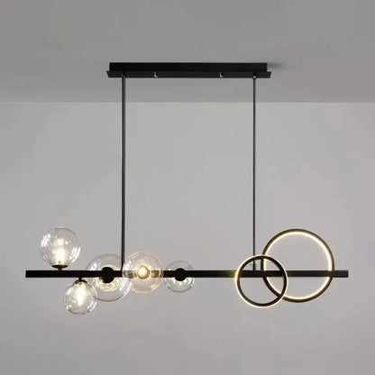 Modern black & gold pendant light with clear glass for dining room