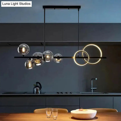 Modern black & gold pendant light with clear glass for dining room