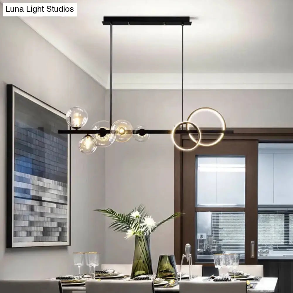 Modern black & gold pendant light with clear glass for dining room