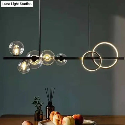 Modern black & gold pendant light with clear glass for dining room