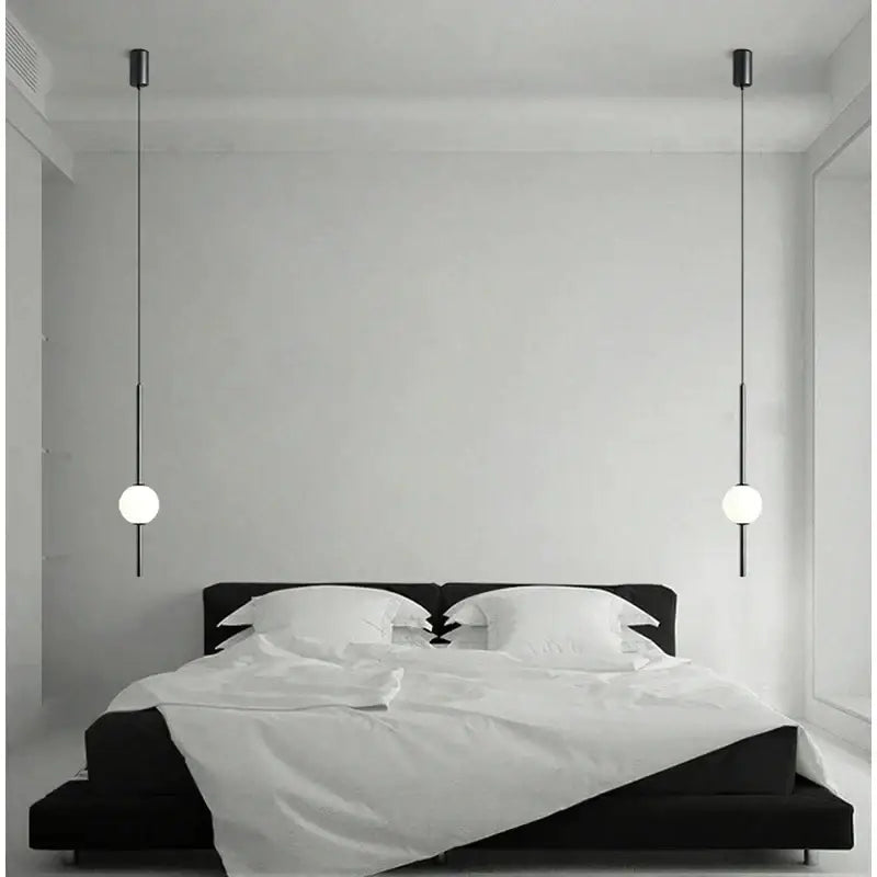 Modern black & gold pendant light with glass shade for living room