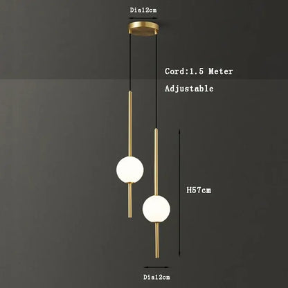 Modern black & gold pendant light with glass shade for living room