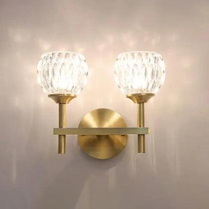 Modern black & gold wall light with dimpled glass for living room