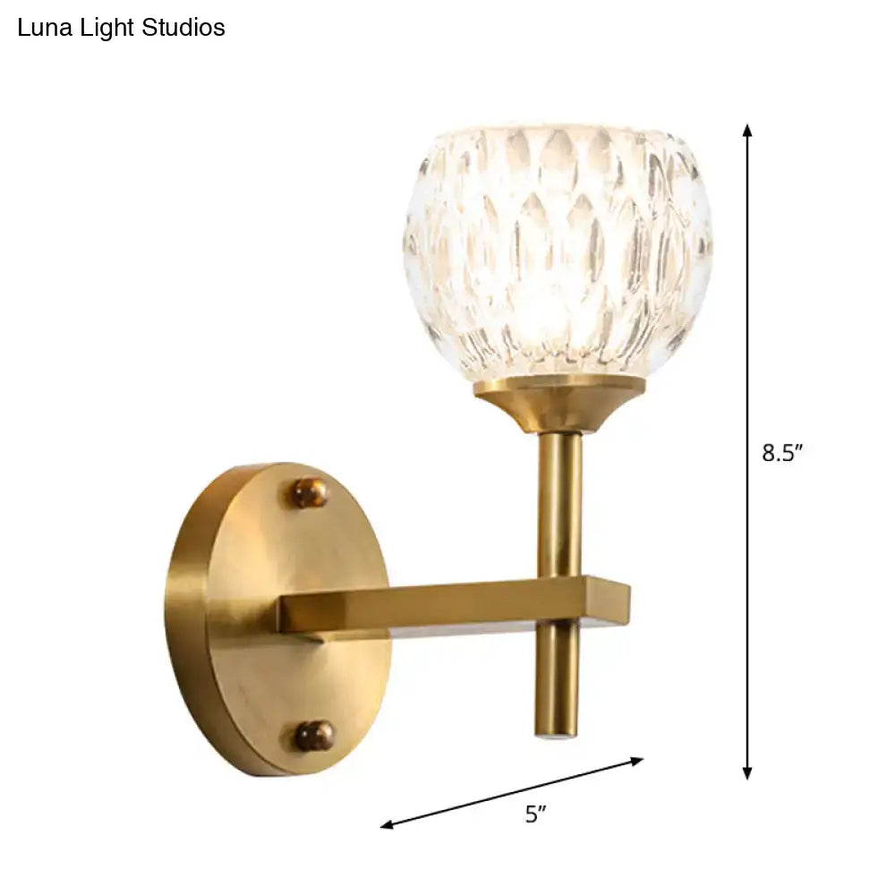 Modern black & gold wall light with dimpled glass for living room