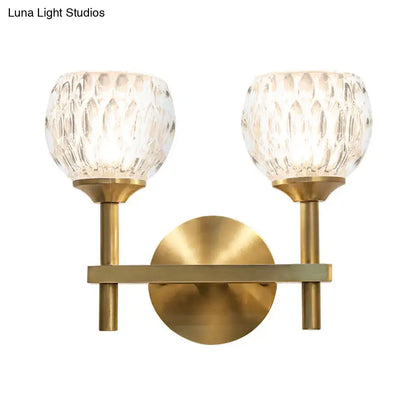 Modern black & gold wall light with dimpled glass for living room