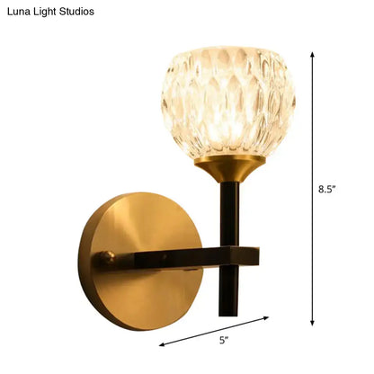 Modern black & gold wall light with dimpled glass for living room